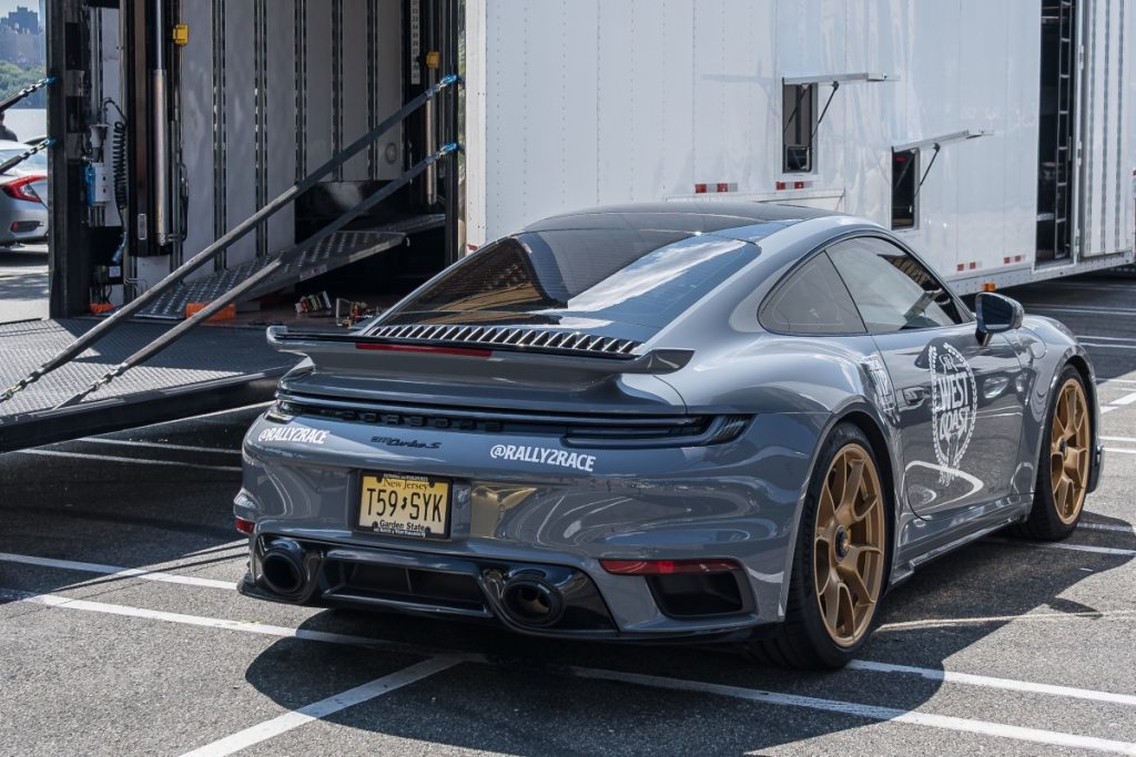 non running car transport 2 A luxury sports car being prepared for loading into a carrier.