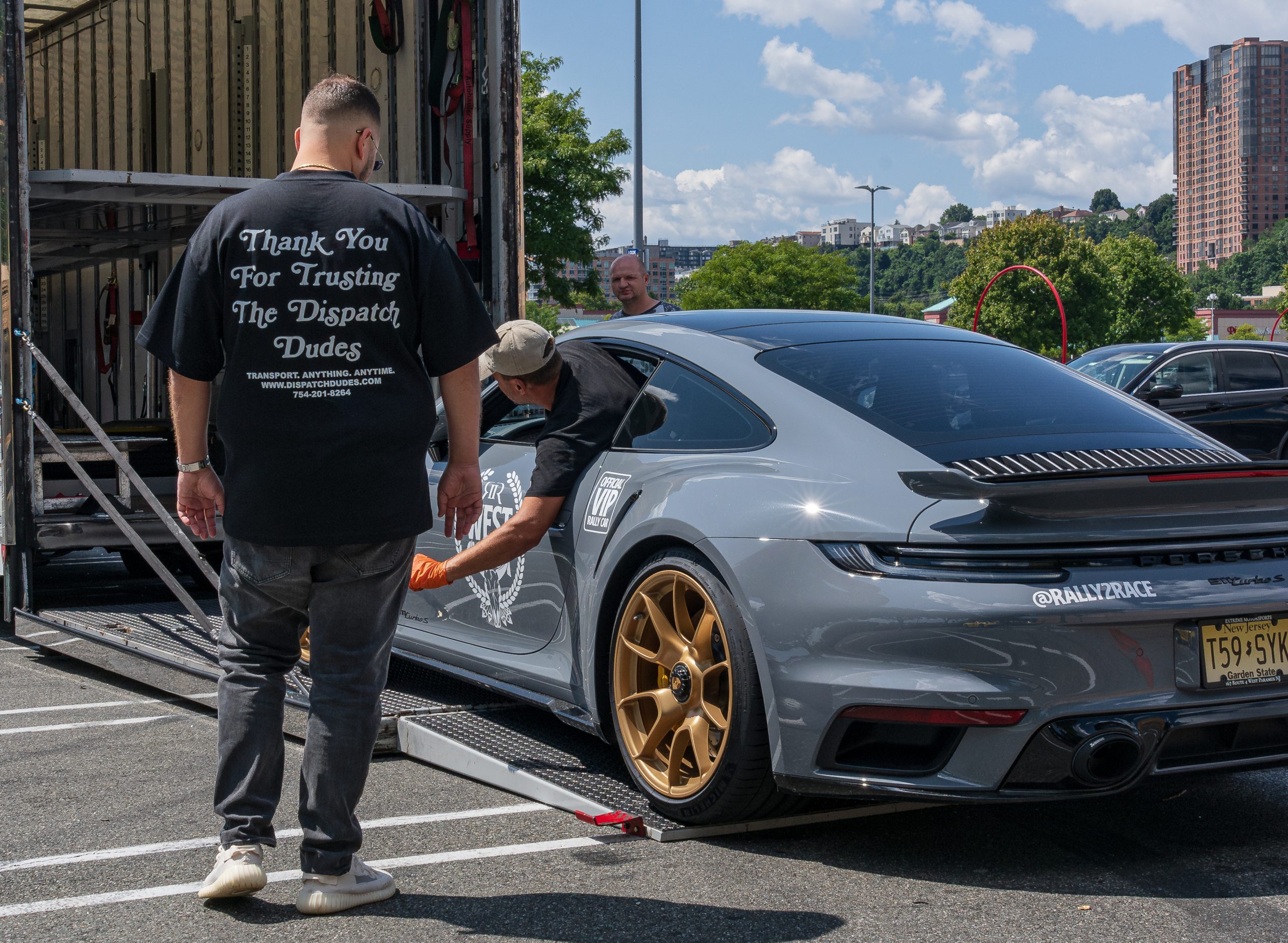 Dispatch Dudes team preparing a vehicle for car shipping service in Florida.