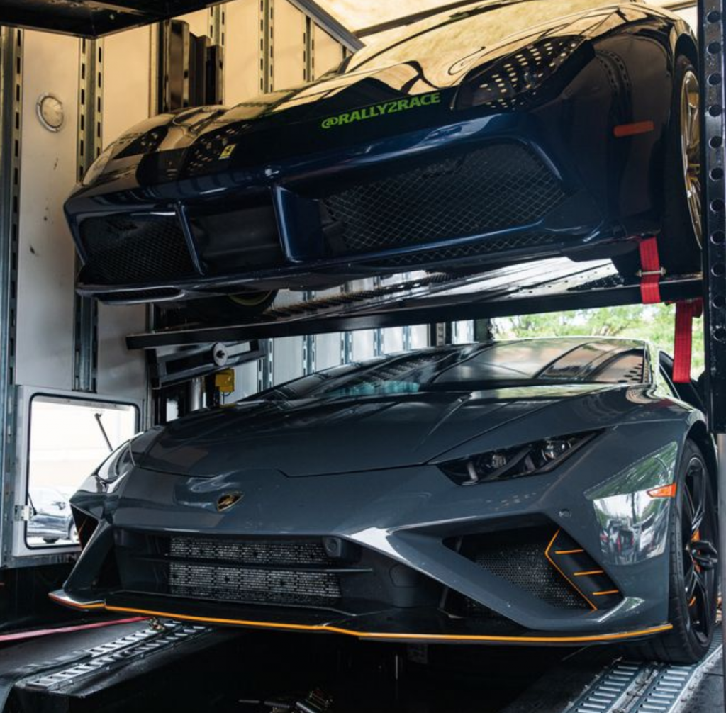 Two cars being shipped to NYC.