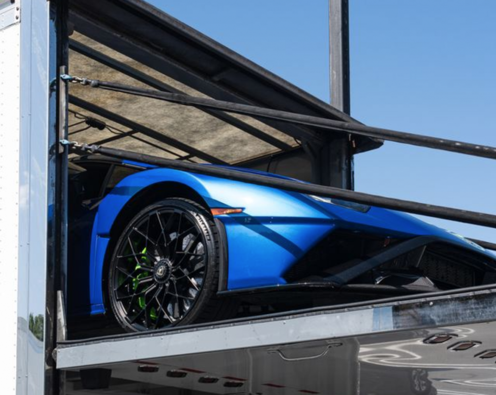 A luxury car being transported in Las Vegas.