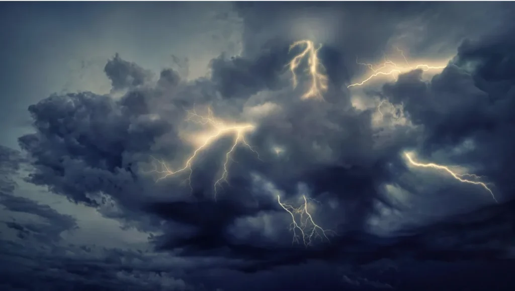 Dark hurricane storm clouds with lightning.