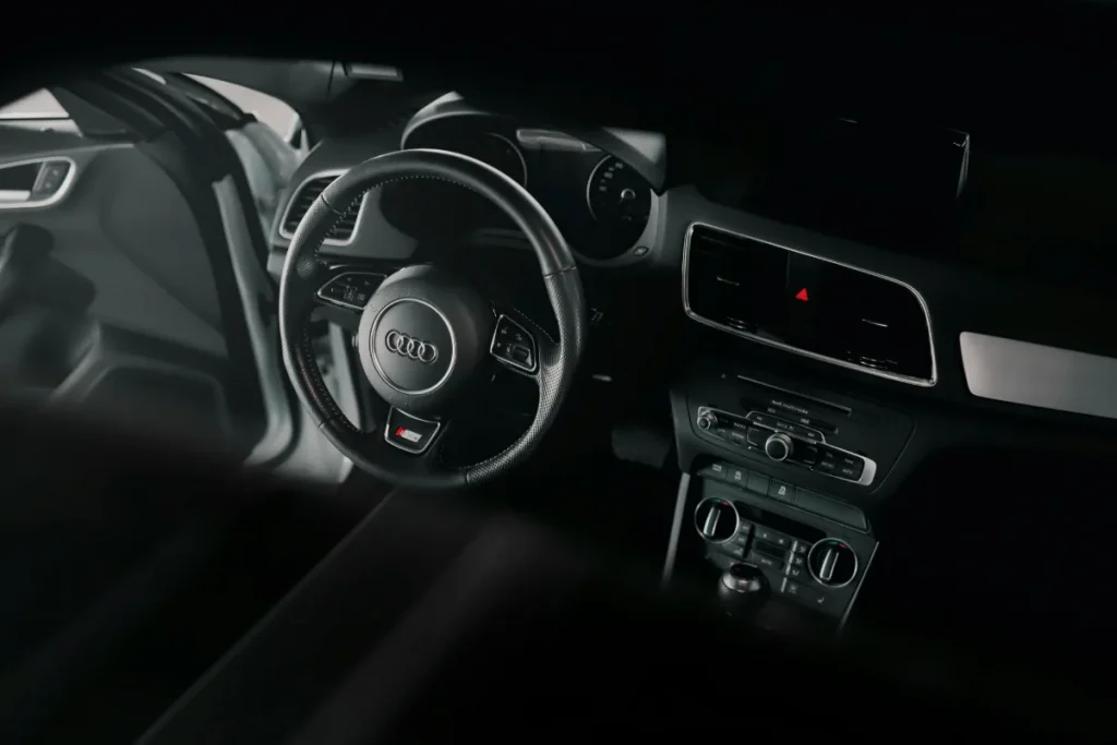 The dashboard and seats of a car interior.